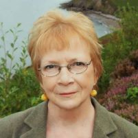 A student posing on top of giant letters during a Study abroad in Amsterdam.